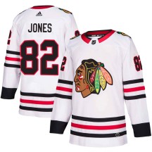 Caleb Jones Chicago Blackhawks Adidas Youth Authentic Away Jersey - White