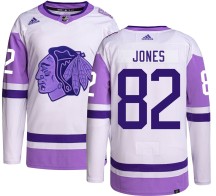 Caleb Jones Chicago Blackhawks Adidas Men's Authentic Hockey Fights Cancer Jersey -