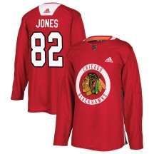 Caleb Jones Chicago Blackhawks Adidas Youth Authentic Home Practice Jersey - Red