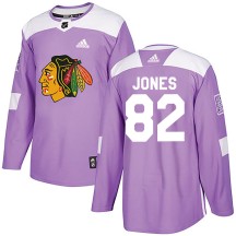 Caleb Jones Chicago Blackhawks Adidas Men's Authentic Fights Cancer Practice Jersey - Purple